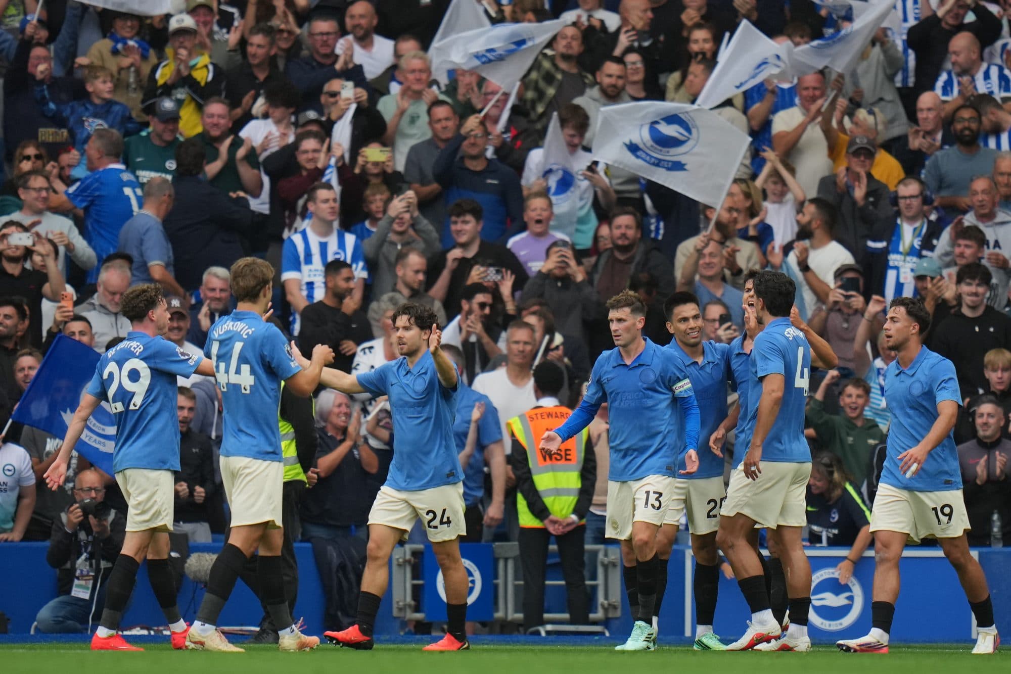 Brighton players celebrate first goal during the English Premier League soccer match between Brighton & Hove Albion and Arsenal in Brighton, England, Saturday, Sept. 19, 2026.